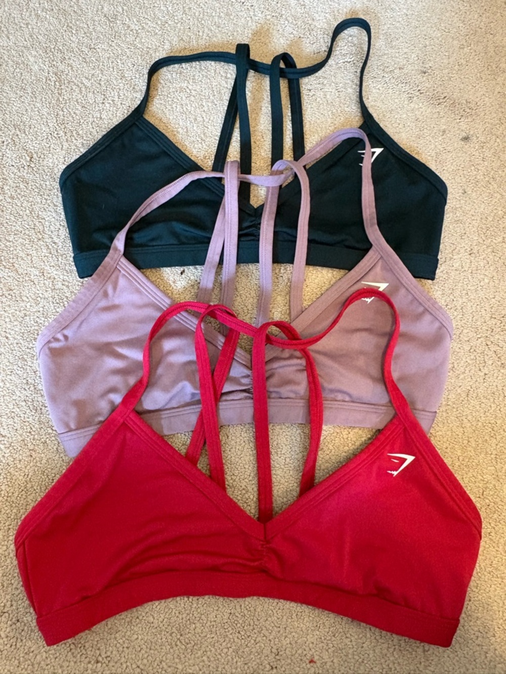 Gymshark Strappy Sports Bras in Red, Lavender, Dark Green - Pack of 3